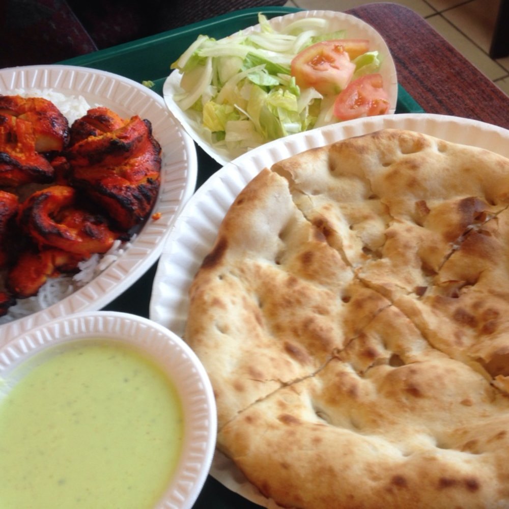Tikka Grill - Chicken tikka over rice with plain naan. - Pakistani Near Me - Jackson Heights, New York Tikka Grill - Chicken tikka over rice with plain naan. - Pakistani Near Me - Jackson Heights, New York