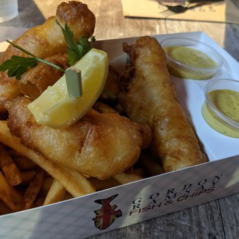 Gordon Ramsay Fish & Chips - Fish & chips (sea salt) with curry mango sauce 4 pieces because ordered extra - Fish & Chips Near Me - Orlando, Florida Gordon Ramsay Fish & Chips - Fish & chips (sea salt) with curry mango sauce 4 pieces because ordered extra - Fish & Chips Near Me - Orlando, Florida