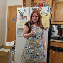 Panacea - My sister loving the adorable apron I got her for her birthday