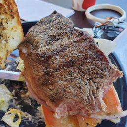 Steak sandwich. Literally a steak on a roll. Steak sandwich. Literally a steak on a roll.