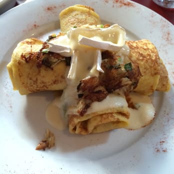 Cafe Conti - Crab and Brie crepes with garlic bechamel! Delicious! - Breakfast & Brunch Near Me - New Orleans, Louisiana Cafe Conti - Crab and Brie crepes with garlic bechamel! Delicious! - Breakfast & Brunch Near Me - New Orleans, Louisiana