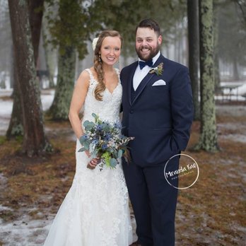 Folklore Flowers - Door County outdoor winter wedding ceremony with unique green and blue bridal bouquet - Florists Near Me - Sister Bay, Wisconsin Folklore Flowers - Door County outdoor winter wedding ceremony with unique green and blue bridal bouquet - Florists Near Me - Sister Bay, Wisconsin