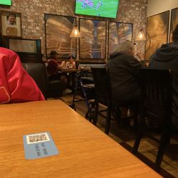 BJ's Restaurant & Brewhouse - Seating area inside of restaurant...