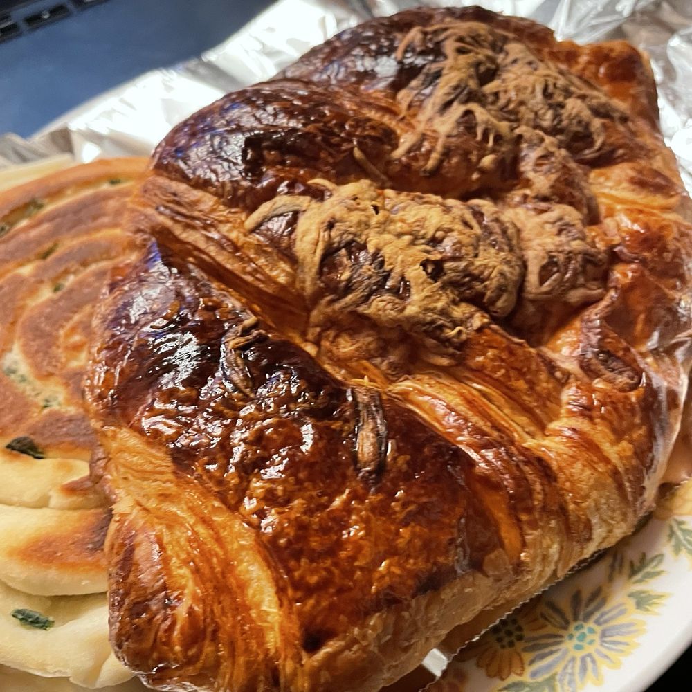 La Farfalla - My fault - I overtoastes it at home when I tried to reheat it. It was originally perfectly golden. - Bakeries Near Me - Newark, California
