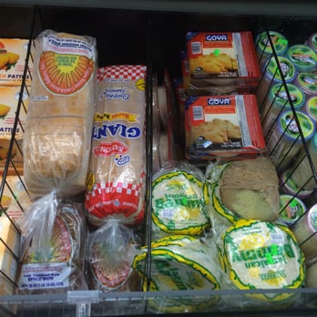 Dat Moi Market - Jamaican patties, hard dough bread, spice bun, bammy and randomly placed yam - International Grocery Near Me - Gardena, California Dat Moi Market - Jamaican patties, hard dough bread, spice bun, bammy and randomly placed yam - International Grocery Near Me - Gardena, California