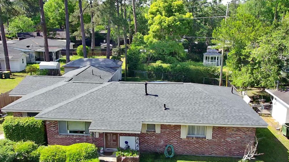 Slide of Palma's Roofing Experts