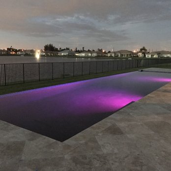 GSM Builders - a pool with purple lighting - General Contractors Near Me - Fort Lauderdale, Florida