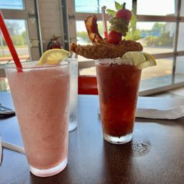 Adult frozen drink and insane Bloody Mary with a chicken strip! A meal in itself!