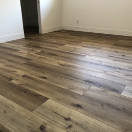 a hardwood floor in a bedroom a hardwood floor in a bedroom