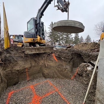 Red Ruddy Group - Excavater hold storm water basin for water detention installation ACO - General Contractors Near Me - Calgary, Alberta Red Ruddy Group - Excavater hold storm water basin for water detention installation ACO - General Contractors Near Me - Calgary, Alberta