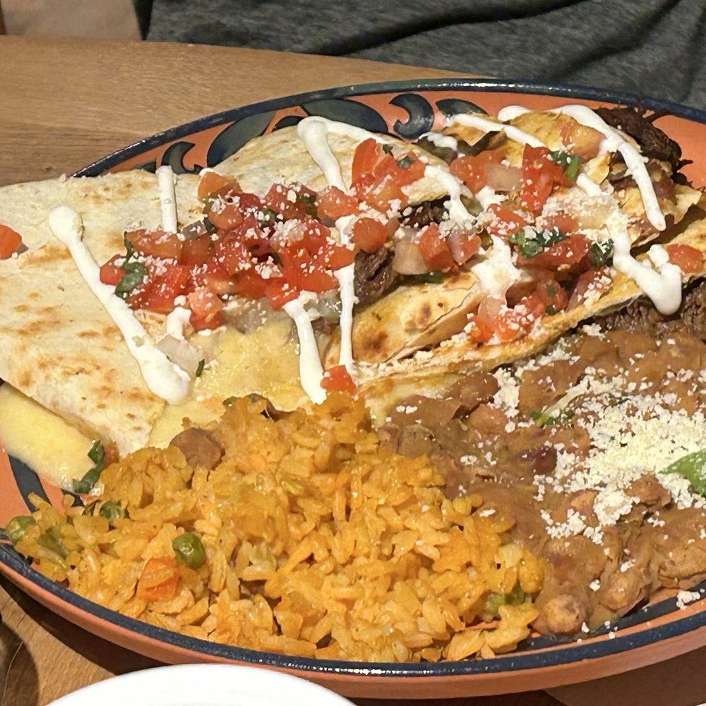 Cinco Ninos - Beef quesadillas with beams and rice. - Mexican Near Me - Wisconsin Dells, Wisconsin Cinco Ninos - Beef quesadillas with beams and rice. - Mexican Near Me - Wisconsin Dells, Wisconsin