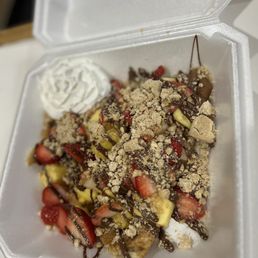 Crepes with Nutella, strawberry, pineapple, maza pan and whip cream Crepes with Nutella, strawberry, pineapple, maza pan and whip cream