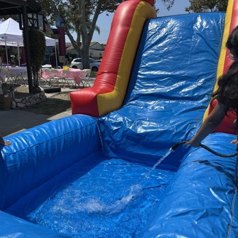 Olivia's backyard playhouse - Water slide - Party Supplies Near Me