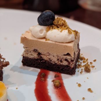 Tiffins Restaurant - Dessert trio - Lion King/caramel mousse - New American Near Me - Lake Buena Vista, Florida Tiffins Restaurant - Dessert trio - Lion King/caramel mousse - New American Near Me - Lake Buena Vista, Florida
