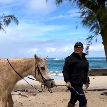 Turtle Bay Horseback Riding - Miss Kylie providing the highest quality customer service to a little girl that's never been on a pony. Thank you - Horseback Riding Near Me - Kahuku, Hawaii Turtle Bay Horseback Riding - Miss Kylie providing the highest quality customer service to a little girl that's never been on a pony. Thank you - Horseback Riding Near Me - Kahuku, Hawaii