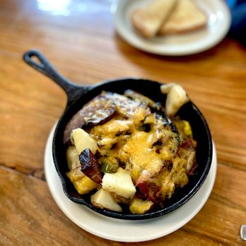 Southern Harmony Cafe - a skillet of food on a table - Southern Near Me - Dade City, Florida Southern Harmony Cafe - a skillet of food on a table - Southern Near Me - Dade City, Florida