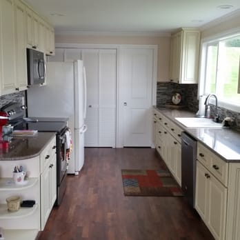 Gawley Building and Remodeling - Installed new kitchen cabinets, flooring, tile backsplash, created new pantry. - General Contractors Near Me