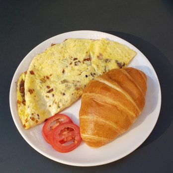 la Madeleine - Custom made omelet with sausage, bacon, and cheddar cheese. - Cafes Near Me - Buford, Georgia la Madeleine - Custom made omelet with sausage, bacon, and cheddar cheese. - Cafes Near Me - Buford, Georgia