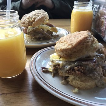 Pine State Biscuits - The Reggie Deluxe and freshly squeezed orange juice - Southern Near Me - Portland, Oregon