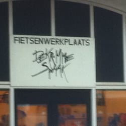 Fietsenwerkplaats de Kromme Spaak - Naam boven de deur