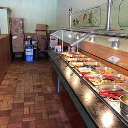 Great Wall - Kind of a sad buffet...combined storage area. Noodles, rice, and sauces drying out on the counter. No one cares to clean it up.