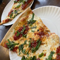 Margerita slice with tomato, fresh mozzarella and fresh basil. Culinary divinity. Margerita slice with tomato, fresh mozzarella and fresh basil. Culinary divinity.