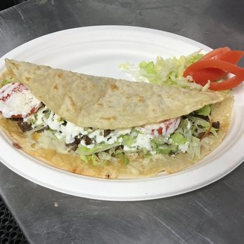 Plaza Oaxaca - a plate of food on a table - Street Vendors Near Me - Pasco, Washington Plaza Oaxaca - a plate of food on a table - Street Vendors Near Me - Pasco, Washington