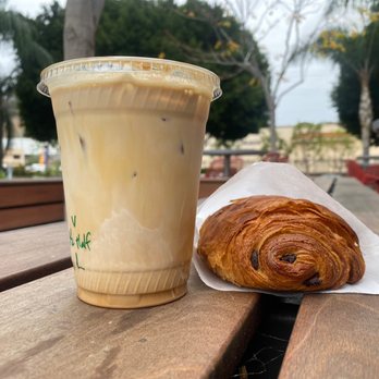 The Kings Craft Coffee - Iced Vanilla Latte sub milk for half & half plus a chocolate croissant - Coffee & Tea Near Me - San Diego, California