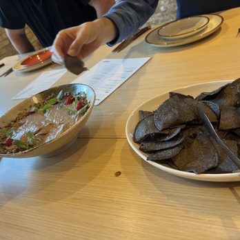 Owamni - bean dip and tortilla chips - New American Near Me - Minneapolis, Minnesota Owamni - bean dip and tortilla chips - New American Near Me - Minneapolis, Minnesota