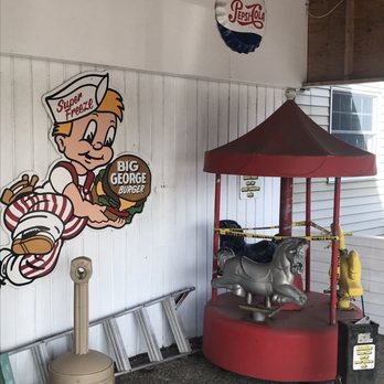 Super Freeze - a little boy riding a carousel - Ice Cream & Frozen Yogurt Near Me - Derby, New York Super Freeze - a little boy riding a carousel - Ice Cream & Frozen Yogurt Near Me - Derby, New York