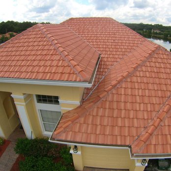 Axiom Contracting Group - Another tile roof completed by Axiom. Eagle Roofing Tile Malibu Terracotta Gold. - Roofing Near Me - Altamonte Springs, Florida Axiom Contracting Group - Another tile roof completed by Axiom. Eagle Roofing Tile Malibu Terracotta Gold. - Roofing Near Me - Altamonte Springs, Florida