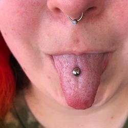 IRIS Studio - Tongue piercing healed and the barbell has been downsized now that initial swelling has subsided. Performed at IRIS Studios Grand Rapids