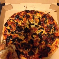 Feliciano's Restaurant & Pizzeria - Mushroom, ham and olive pizza and some free rosemary chicken wings thrown in. Damn tasty!