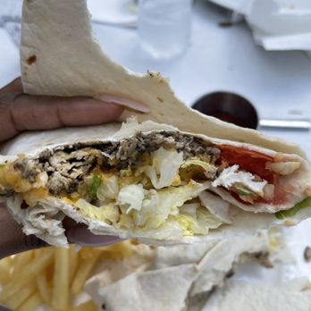 Blue Mountain Coffee House - Inside of jerk chicken wrap - Coffee & Tea Near Me - West Palm Beach, Florida