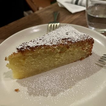 Bettina - Olive oil cake. Perfect flavor...just wish it were served warm - Pizza Near Me - Santa Barbara, California Bettina - Olive oil cake. Perfect flavor...just wish it were served warm - Pizza Near Me - Santa Barbara, California