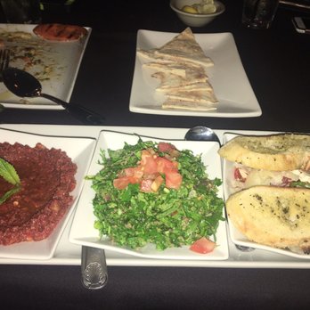 Mezza Grille - Pick 3 appetizer: red pepper dip, tabbouleh, and bruschetta - Mediterranean Near Me - Houston, Texas Mezza Grille - Pick 3 appetizer: red pepper dip, tabbouleh, and bruschetta - Mediterranean Near Me - Houston, Texas