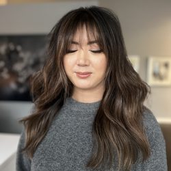 Ellemod - Brunette balayage, long layered haircut and wispy bangs by Krystelle