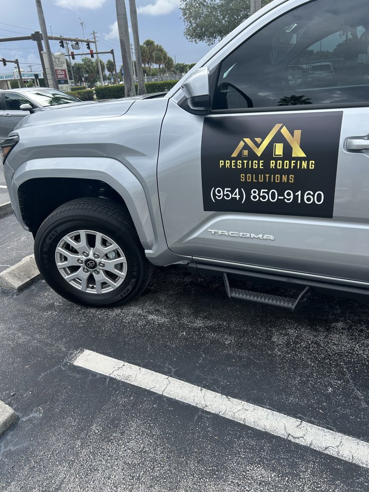 Slide of Prestige Roofing Solutions