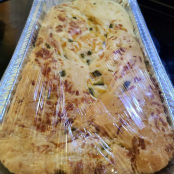 Amanda's Rolls Bakery Cafe - a loaf of bread wrapped in plastic - Bakeries Near Me - Topeka, Kansas Amanda's Rolls Bakery Cafe - a loaf of bread wrapped in plastic - Bakeries Near Me - Topeka, Kansas