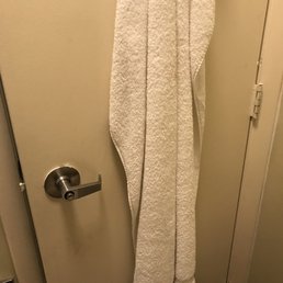 Dirty door and used towel Dirty door and used towel