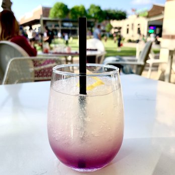Dish Society - BUTTERFLY EFFECT, butterfly pea blossom iced tea, delicious once watered down by the ice. Very sweet. - New American Near Me - Katy, Texas Dish Society - BUTTERFLY EFFECT, butterfly pea blossom iced tea, delicious once watered down by the ice. Very sweet. - New American Near Me - Katy, Texas