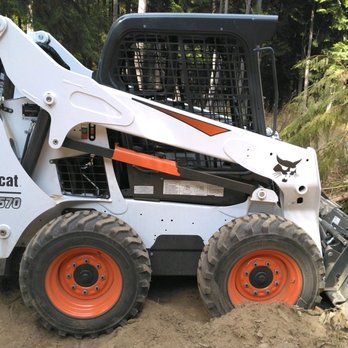Turn-key Construction & Renovation - a bobcat ski - loader - General Contractors Near Me - Sagle, Idaho Turn-key Construction & Renovation - a bobcat ski - loader - General Contractors Near Me - Sagle, Idaho