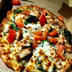 Panago Pizza - Persinal make your own pizza...pesto sauce, mozzarella, chicken, spinach, fresh tomatoes, and roasted garlic