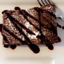 Brownie dessert with raspberry sauce Brownie dessert with raspberry sauce