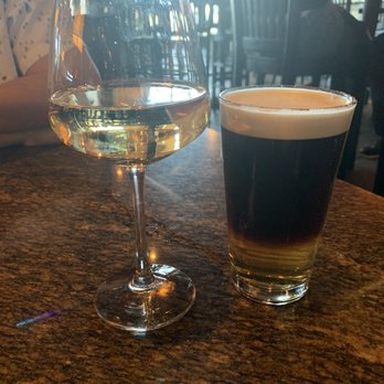 BJ's Restaurant & Brewhouse - House wine from the happy hour menu and a snakebite. - New American Near Me - San Antonio, Texas