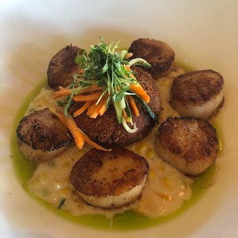 Eddie Merlot's - Scallops with jalapeno creamed corn and truffled potato cake - Seafood Near Me - Columbus, Ohio Eddie Merlot's - Scallops with jalapeno creamed corn and truffled potato cake - Seafood Near Me - Columbus, Ohio