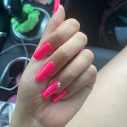 Lyn Nails - These are my natural nails with gel polish and a gem.