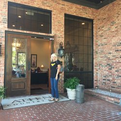 Athens Country Club - Wonder Woman opening the front door for the superhero-themed dinner party sponsored by the Rotary Club