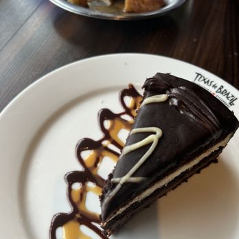 Texas de Brazil - Long Island - Triple chocolate cake! Also a side of sweet plantains to the back! - Steakhouses Near Me - Lake Grove, New York Texas de Brazil - Long Island - Triple chocolate cake! Also a side of sweet plantains to the back! - Steakhouses Near Me - Lake Grove, New York