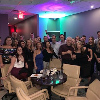 Mirage38 - a group of people posing for a picture - Cocktail Bars Near Me - Houston, Texas